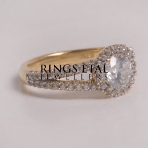 Dual shank engagement ring with Cubic zirconia stones